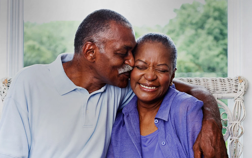 a man and woman embracing